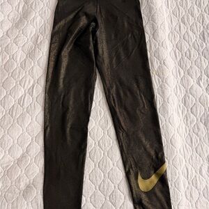 Nike Run Black Metallic Leggings with Gold Swoosh Accent